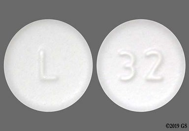 White Round 32 And L - Amlodipine Besylate 10mg Tablet