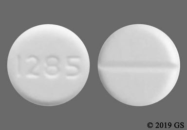 White Round 1285 - Baclofen 10mg Tablet