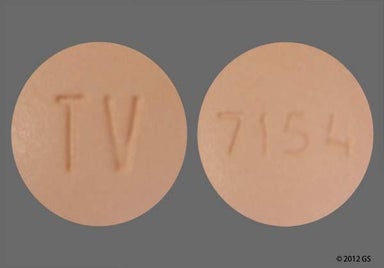 Tan Round 7154 - Simvastatin 20mg Tablet