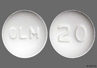 White Round OLM - Olmesartan Medoxomil 20mg Tablet