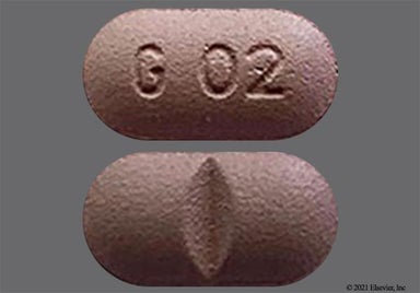 Purple Oblong G 02 - Colchicine 0.6mg Tablet