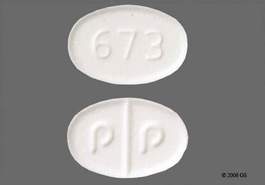 White Oval P P And 673 - Cabergoline 0.5mg Tablet