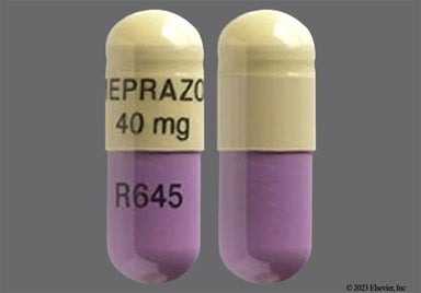Purple, Yellow Capsule OMEPRAZOLE 40 mg R645 - Omeprazole 40mg Delayed-Release Capsule
