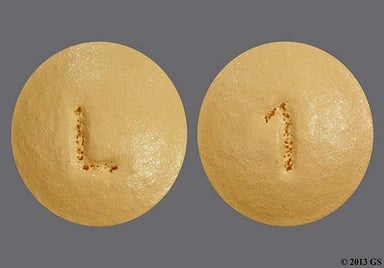 Yellow Round L And 1 - Trospium Chloride 20mg Tablet