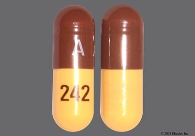 Brown And Yellow A 242 - Doxycycline Monohydrate 100mg Capsule
