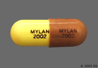 Brown And Yellow Mylan 2002 Mylan 2002 - Thiothixene 2mg Capsule