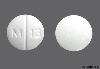White Round M 13 - Tolbutamide 500mg Tablet