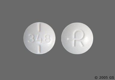 White Round LOGO - Propylthiouracil 50mg Tablet