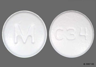 White Round M And C34 - Carvedilol 25mg Tablet