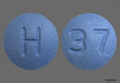 Blue Round 37 And H - Finasteride 5mg Tablet