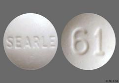 White Round 61 And Searle - Diphenoxylate Hydrochloride / Atropine Sulfate 2.5mg-0.025mg Tablet