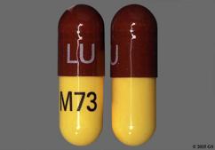 Brown And Yellow Lu M73 - Doxycycline Monohydrate 100mg Capsule
