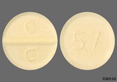 Yellow Round C C And 57 - Clozapine 100mg Tablet