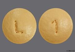 Yellow Round 1 And L - Trospium Chloride 20mg Tablet