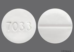 White Round 7033 - Fludrocortisone Acetate 0.1mg Tablet