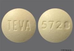 Beige Round 5728 And Teva - Famotidine 20mg Tablet