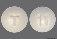 Yellow Round T And 11 - Famotidine 20mg Tablet