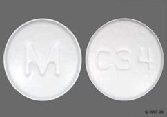 White Round C34 And M - Carvedilol 25mg Tablet